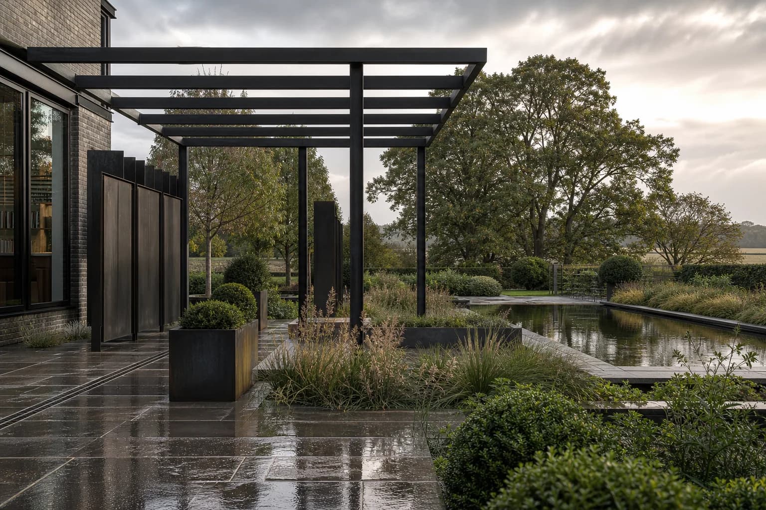 Contemporary garden with bespoke architectural metal structures