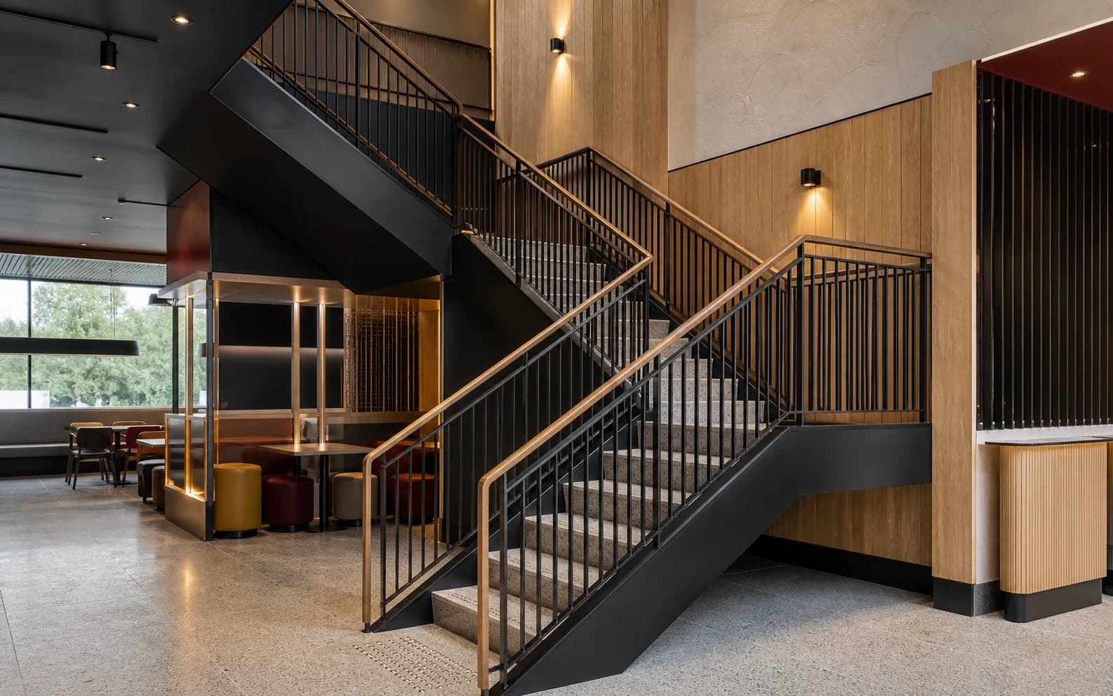 Representative visual of a bespoke blackened-steel restaurant staircase