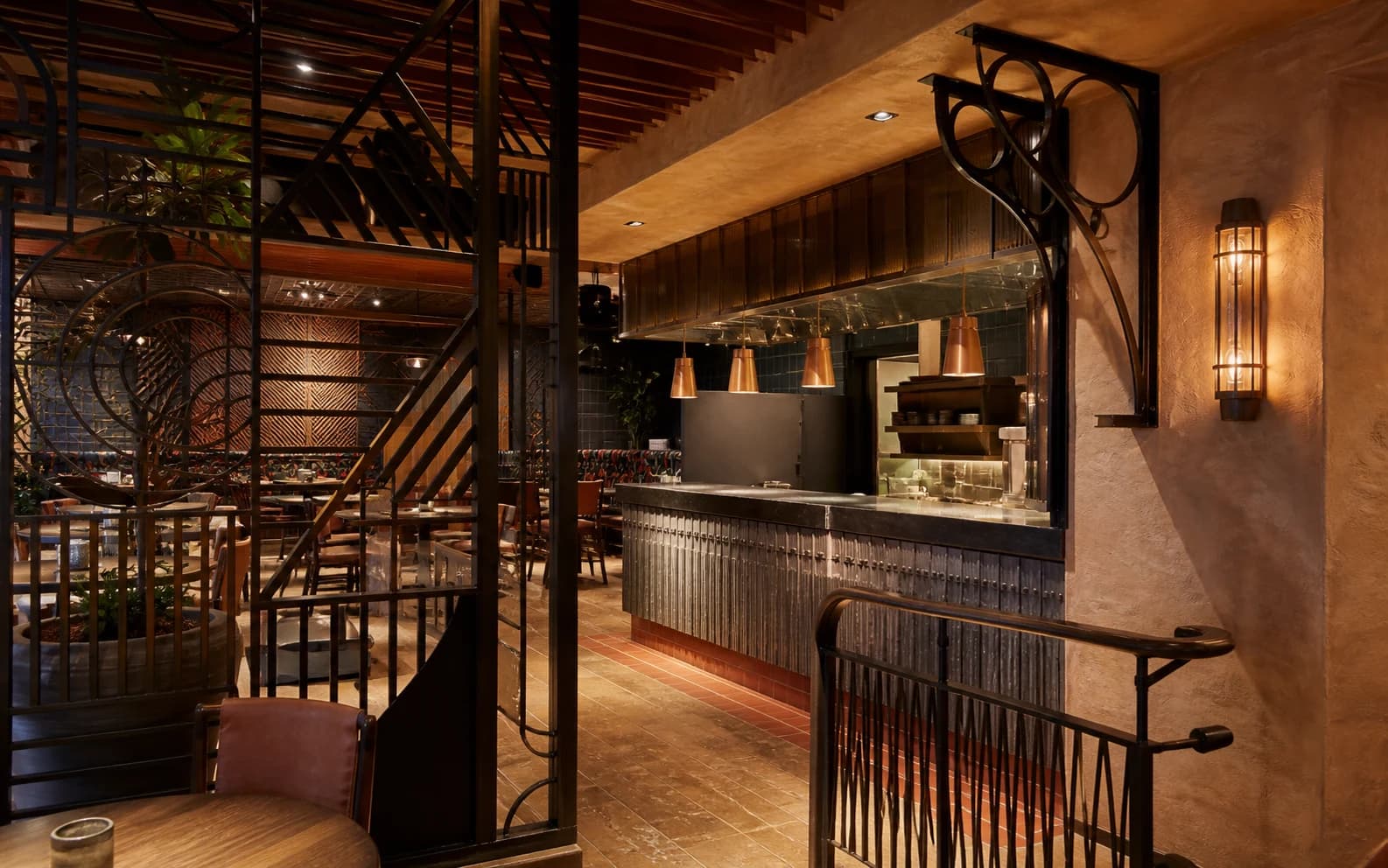 Representative visual of custom blackened-steel metalwork in a restaurant interior