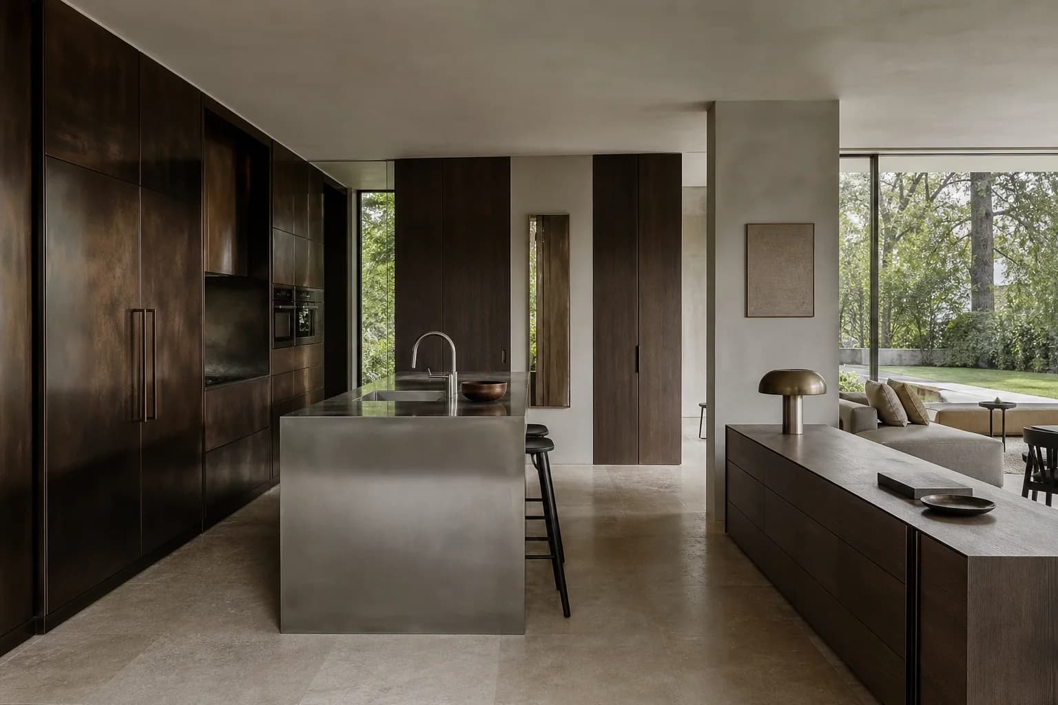 Bespoke dark metal and stone kitchen in a private residence