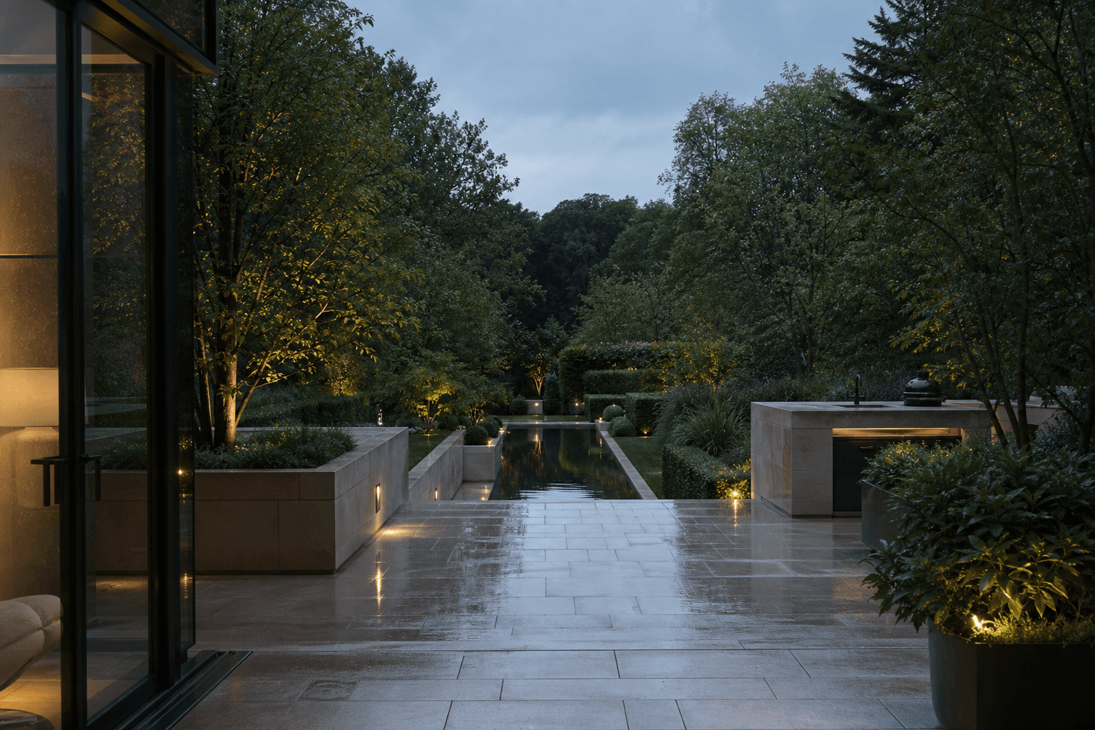 Contemporary English garden with a reflection pool at dusk